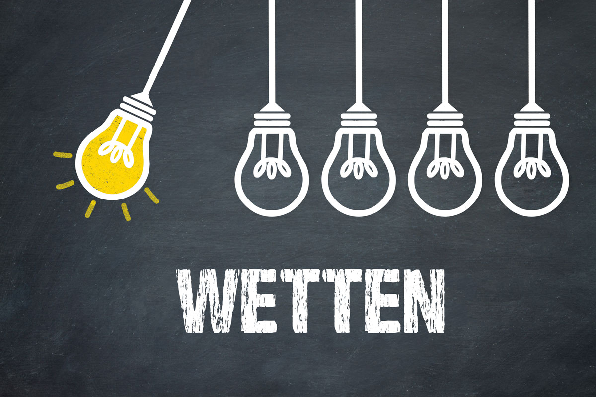 Wettbüro mit Bildschirmen und Quotenanzeige